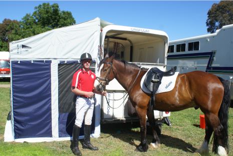 The EZY Annexe for use as a horse float tent at a competition, adapted to provide a completely enclosed space for the comfort and privacy of the rider.
