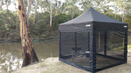 Altegra 3x3 Gazebo with mesh walls set up on the river for camping or fishing - zipped together mosquito proof mesh, installed in no time.