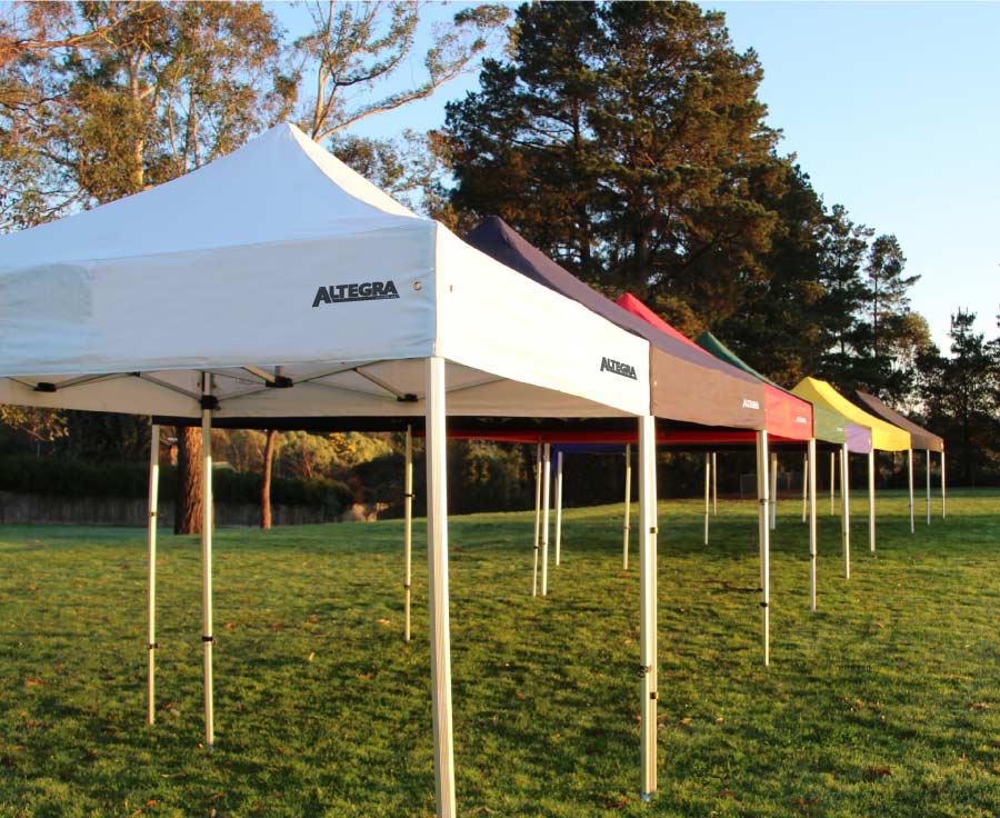 Altegra gazebo and folding marquee lineup in the park showing the full range of sizes and colours - for gazebos in melbourne, choose Altegra.