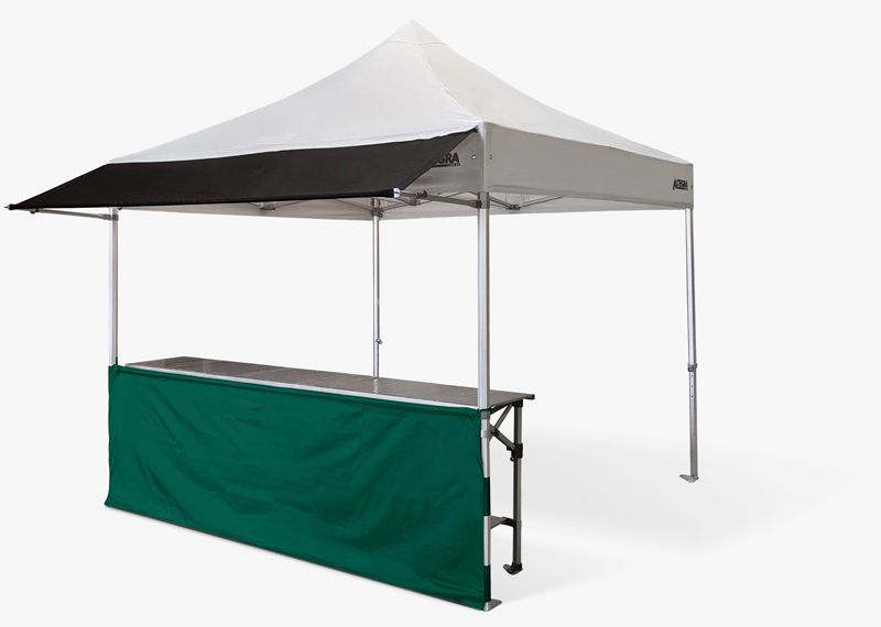 Altegra buy gazebo and marquee accessories image - heavy duty 3x3m gazebo in white with seamless awning attached, a 3m half wall in green, and paired with our sturdy 3m folding aluminium table. The perfect market stall, serving station, or exhibitor's stand. See more marquee accessories.