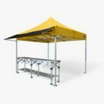 Altegra 3m Gazebo Awning in black attached to a 3x3m Heavy Duty gazebo with yellow canopy and paired with a 3m aluminium folding table - a perfect market stall, exhibitor stand, or entertaining tent starter kit. Black gazebo awning.