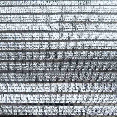 Altegra Aluminet fabric is a wide weave of a hardy aluminium foil and polyethylene monofilament, resulting in a durable fabric that reflects heat and allows airflow.